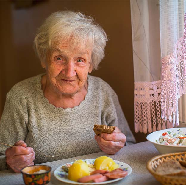 Elderly Woman Eating